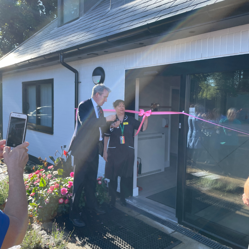 Damian Hinds cutting a ribbon at the Badgerswood Maternity Hub